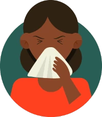 Woman sneezing from a mold allergy